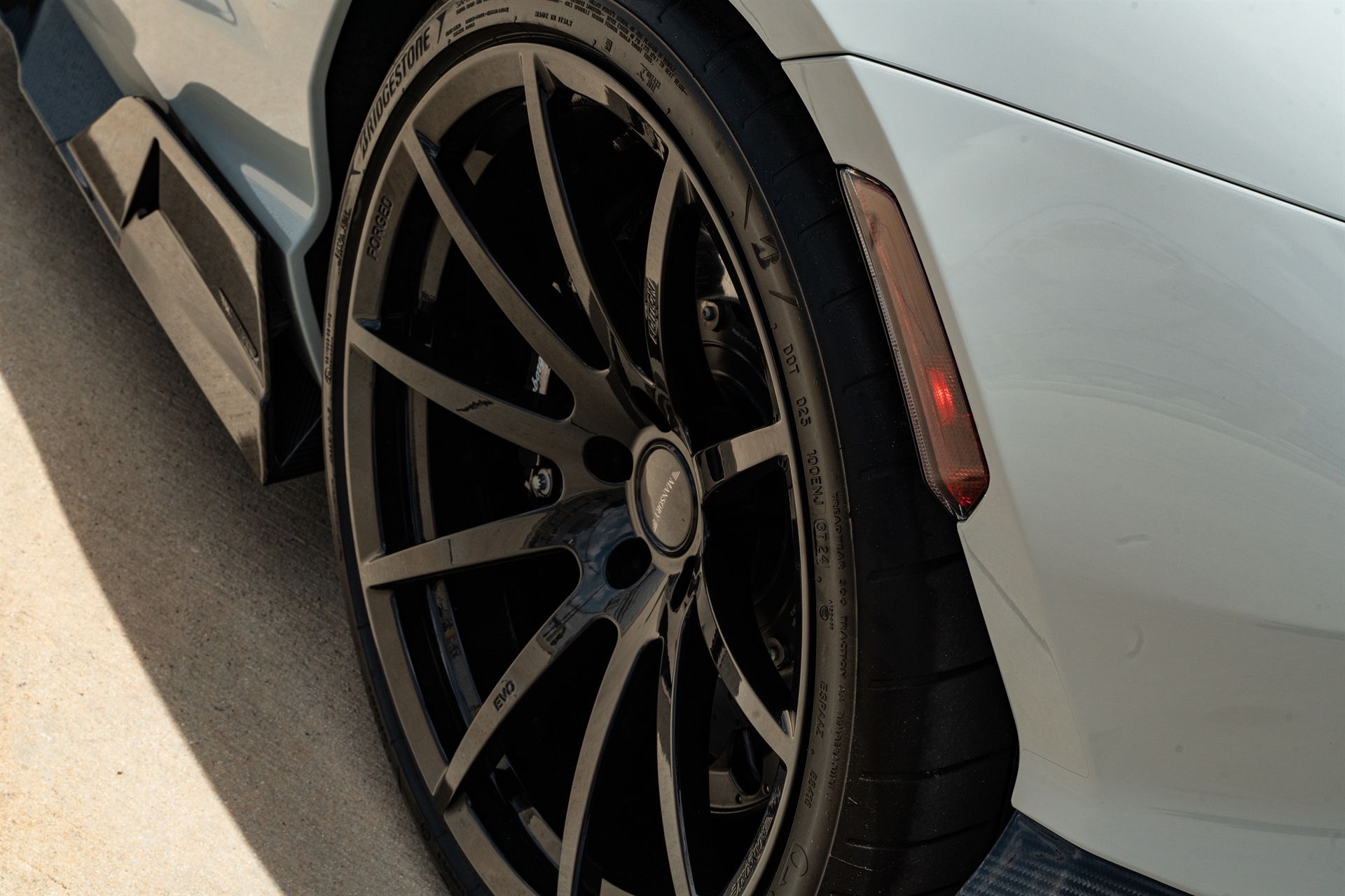 MANSORY Lamborghini Revuelto | Grigio Hati | on Mansory FV.10 Wheels | Gloss Black