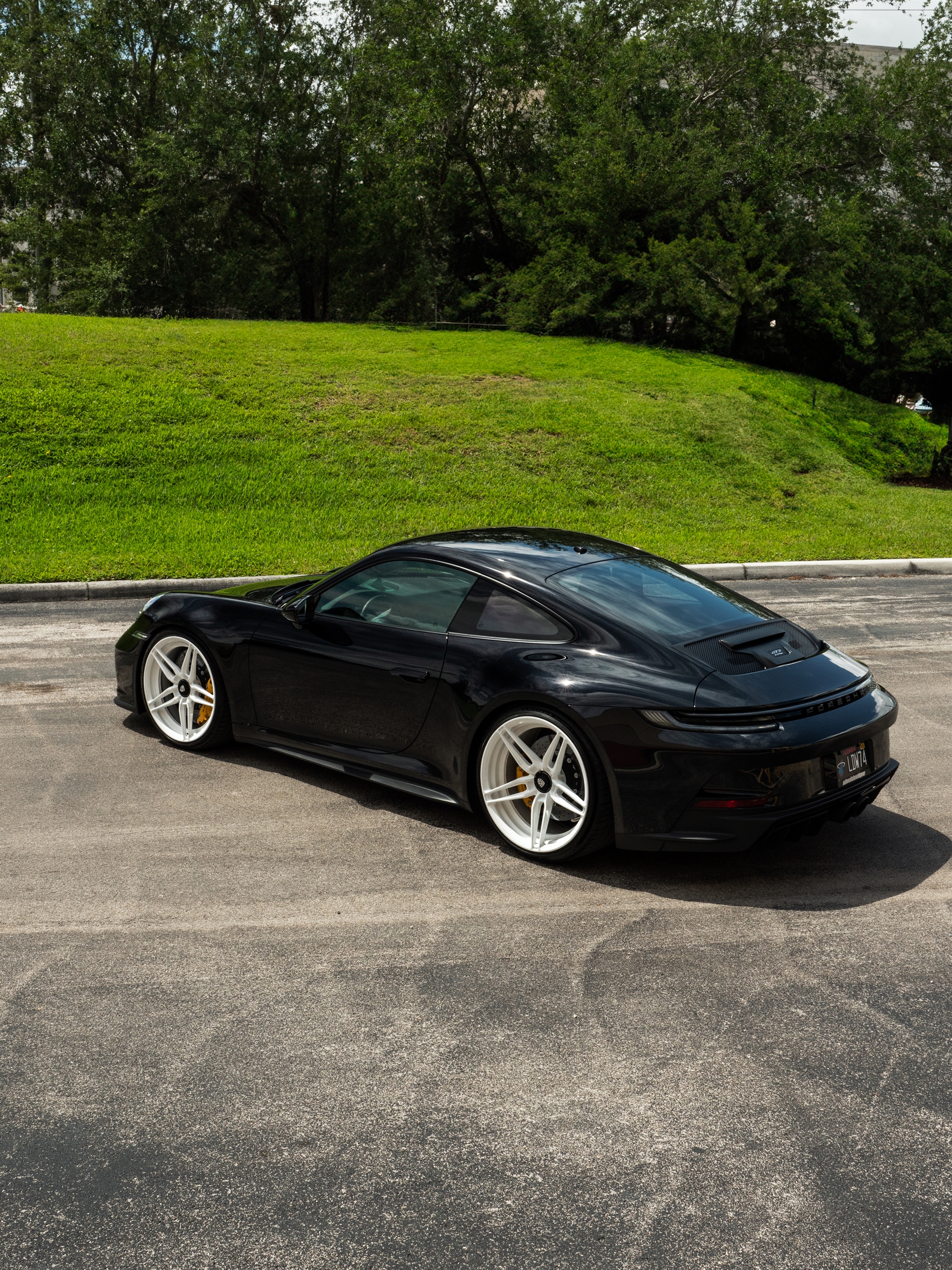 Porsche 992 GT3 Touring | Black | on ANRKY AN27 | Gloss White