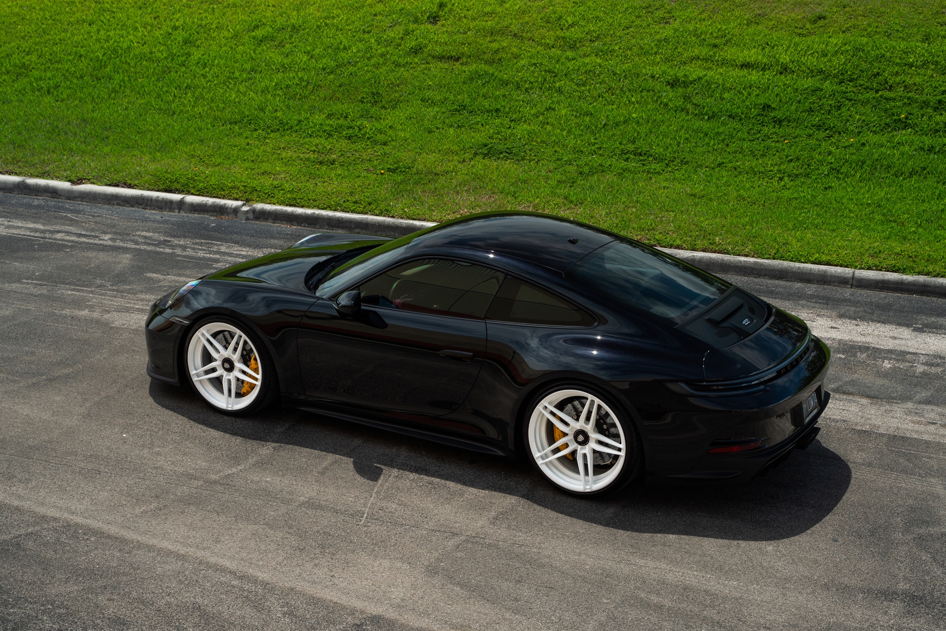 Porsche 992 GT3 Touring | Black | on ANRKY AN27 | Gloss White