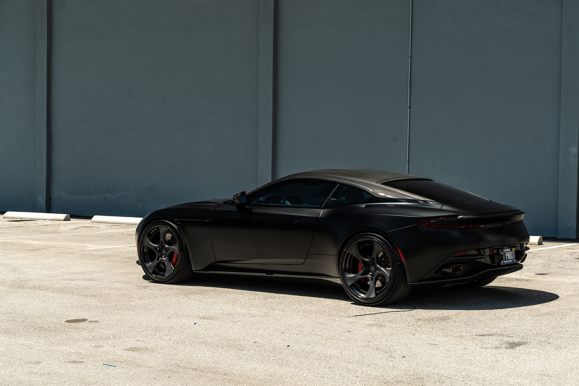 Aston Martin | Satin Jet Black | on ANRKY XR-305 | Satin Mirror Polished Smoke