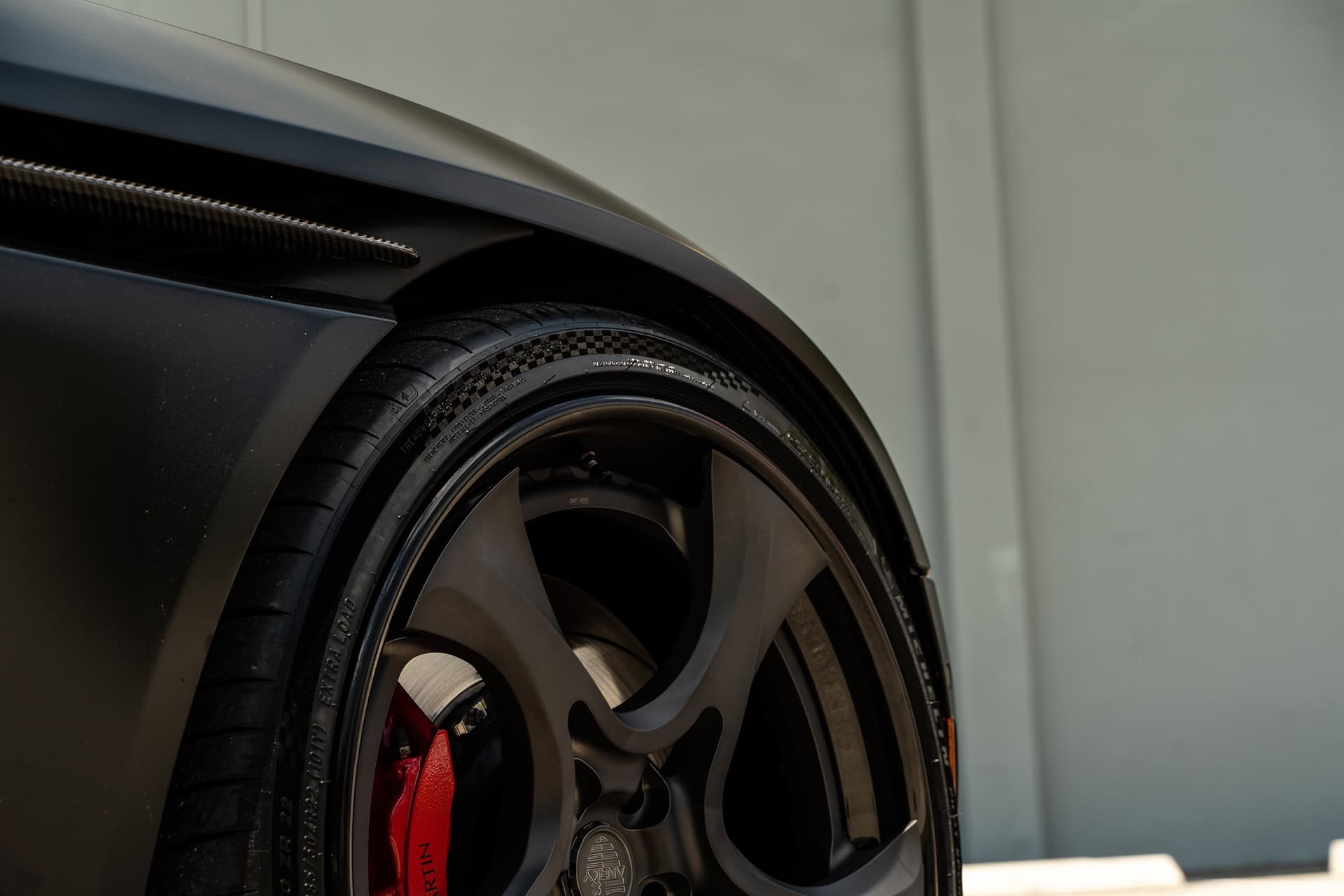 Photo 25 of Aston Martin | Satin Jet Black | on ANRKY XR-305 | Satin Mirror Polished Smoke