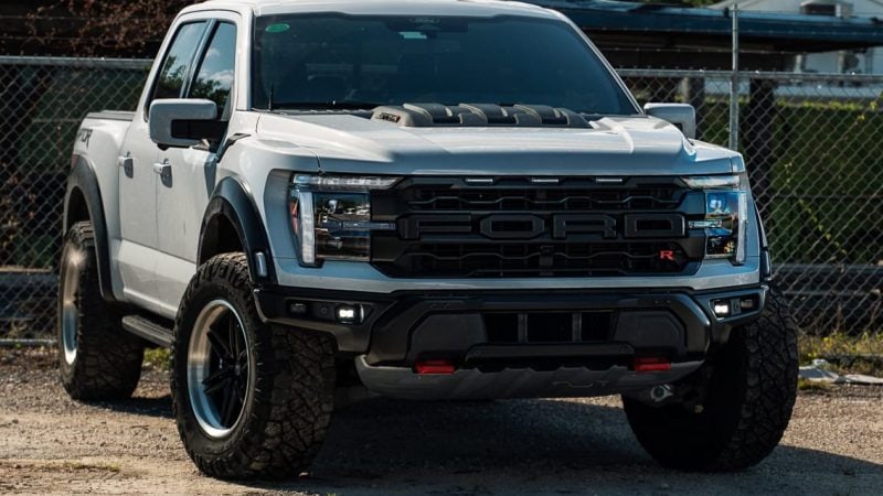 Side profile shot of a Ford Raptor fitted with 20x11 ANRKY AN36-0 wheels in satin black centers and brushed clear barrels, wrapped in 37x12.5x20 Nitto tires