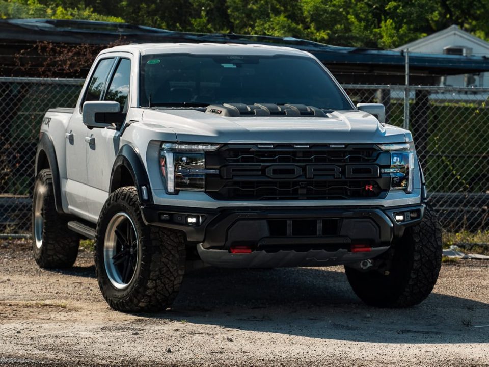Side profile shot of a Ford Raptor fitted with 20x11 ANRKY AN36-0 wheels in satin black centers and brushed clear barrels, wrapped in 37x12.5x20 Nitto tires