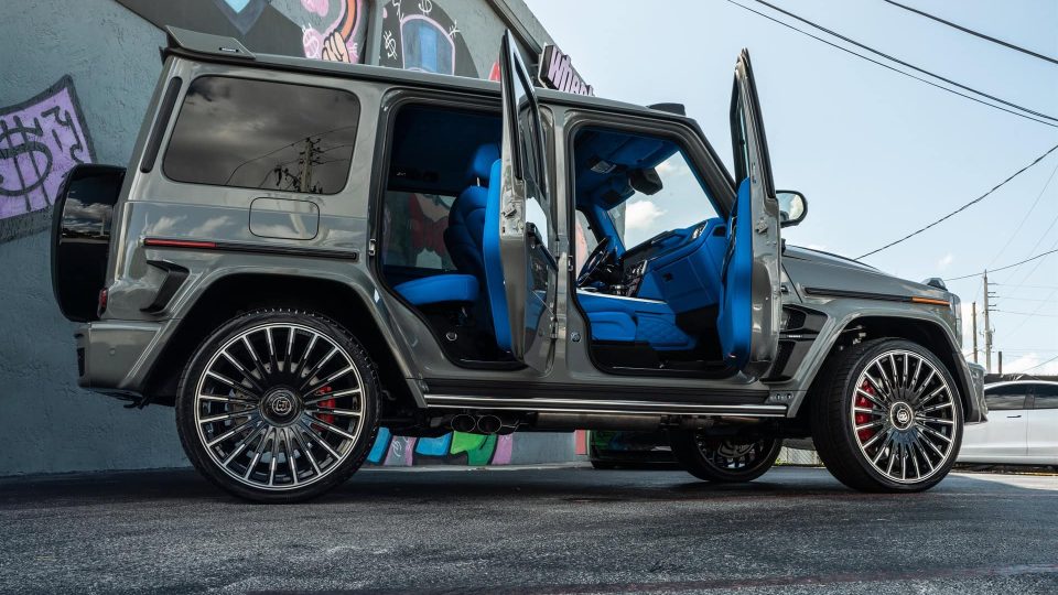 Side view of Arabian Grey Mercedes-Benz G-Class with Brabus Monoblock Z black and silver wheels and Brabus Widestar Widebody Kit