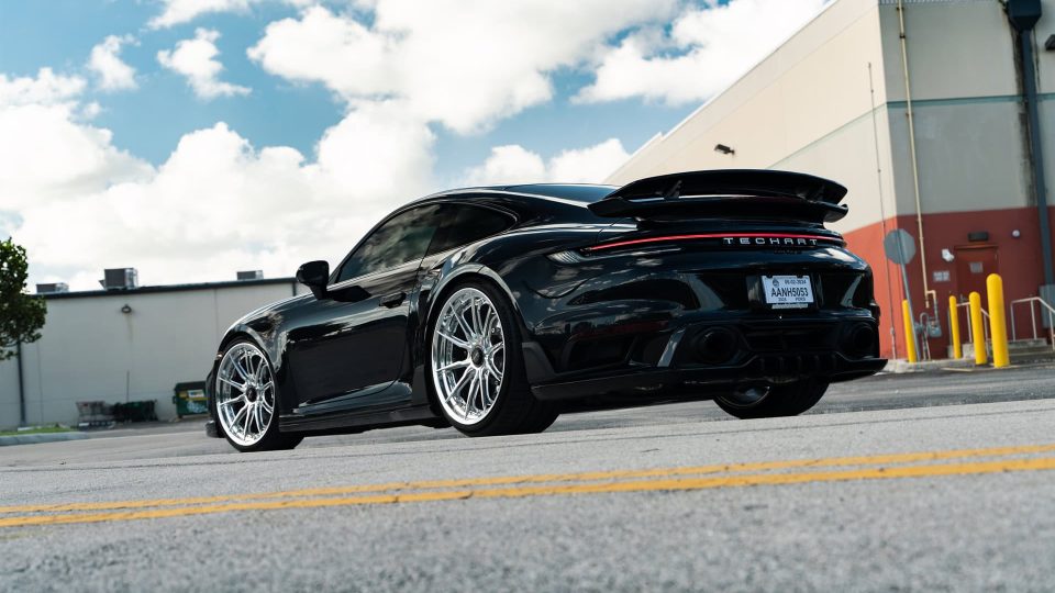 Porsche 992 Turbo S | Jet Black Metallic | on HRE S104SC | Polished Clear | Techart Aero Kit
