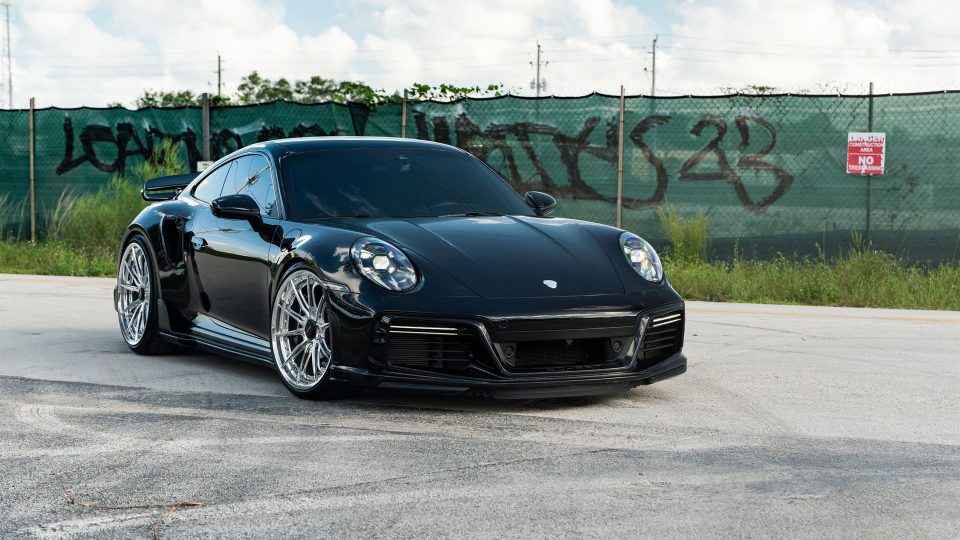 Porsche 992 Turbo S | Jet Black Metallic | on HRE S104SC | Polished Clear | Techart Aero Kit